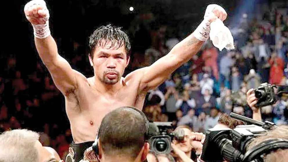 El boxeador Manny Pacquiao celebra un triunfo en el cuadrilátero, tras un encuentro focial. DEPORT.COM