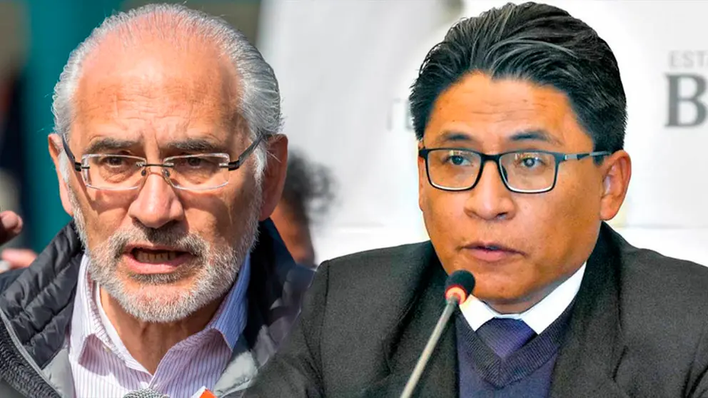El expresidente Carlos Mesa y el ministro de Justicia, Iv&aacute;n Lima. ARCHIVO