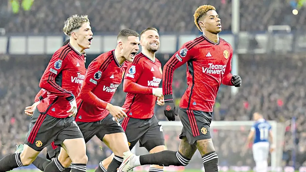 Futbolistas de los Red Devils festejan una conquista. / DIRECTVSPORTS.COM