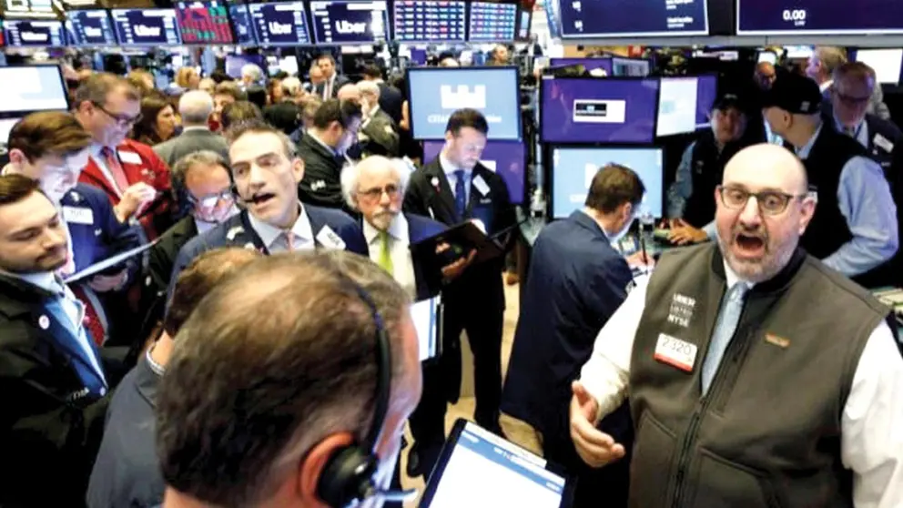 Operadores de Wall Street en una jornada de trabajo./ LOS ANGELES TIMES