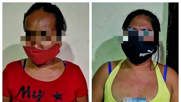 Las conductoras aprehendidas por el transporte ilegal de haitinas.