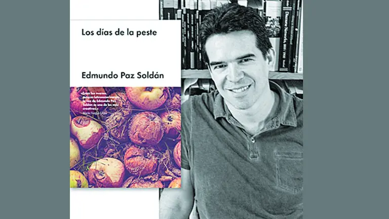 El escritor Edmundo Paz Soldán al lado de su obra. ARCHIVO