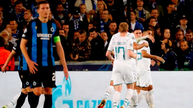 Jugadores del Manchester City festejan una conquista en la goleada 1-5 ante Brujas por la Champions League. EFE