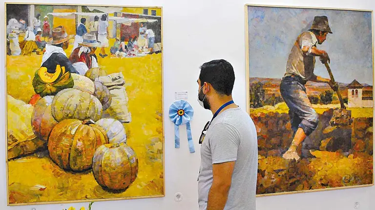 A la izquierda la obra ganadora &ldquo;Zapallos&rdquo; y a la derecha &ldquo;Jornada Laboral&rdquo;, ambas de Ruperto Salvatierra.  NOÉ PORTUGAL