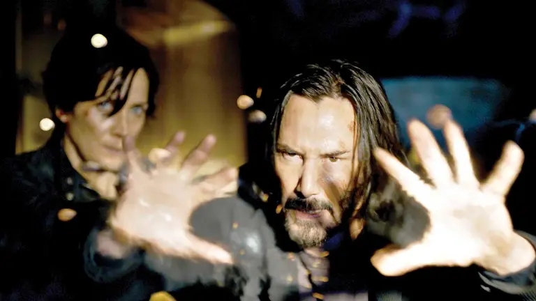 Carrie Anne-Moss y Keanu Reeves retornan como Trinity y Neo en esta nueva entrega de la franquicia. WARNER BROS
