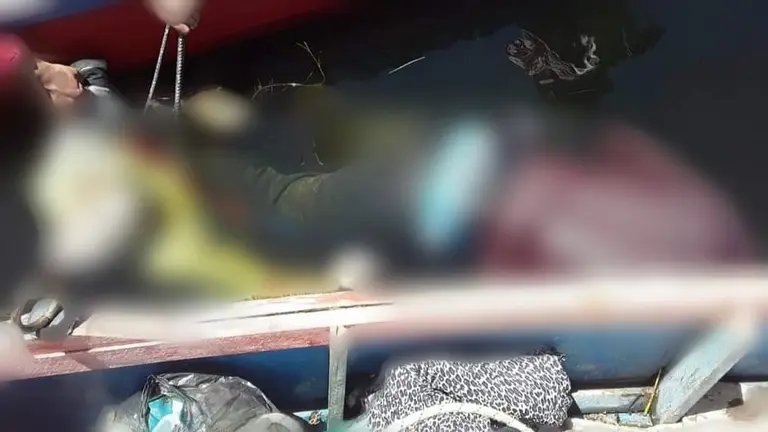 Los cuerpos de las v&iacute;ctimas, en Desaguadero. BINACIONAL TV CANAL 11 DESAGUADERO PER&Uacute;-BOLIVIA