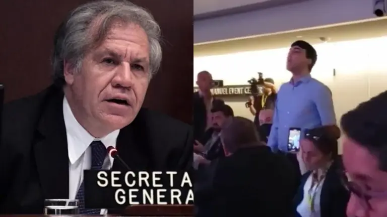 El secretario general de la OEA, Luis Almagro, y el joven que lo increp&oacute; durante una conferencia. ARCHIVO