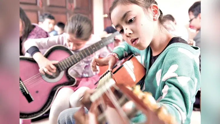 Ni&ntilde;os expresan su talento musical./ ARCHIVO