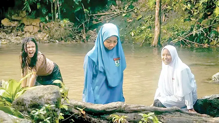 Una escena de la pel&iacute;cula malaya que gan&oacute; el premio en Cannes./ INFOBAE