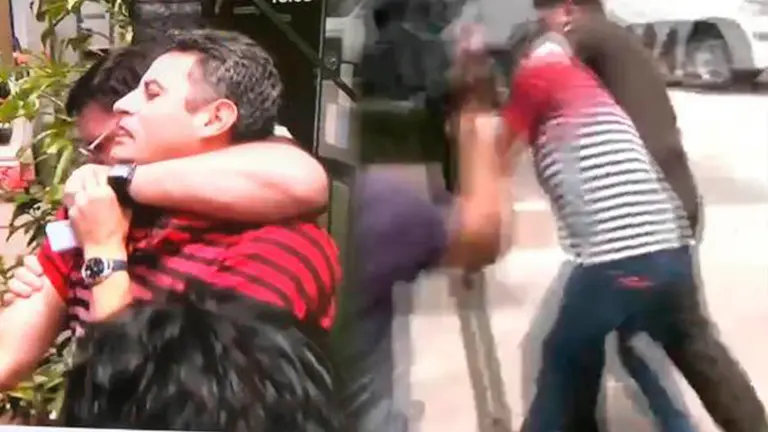 El comandante Erick Olgu&iacute;n toma del cuello al capit&aacute;n Lara. CAPTURA