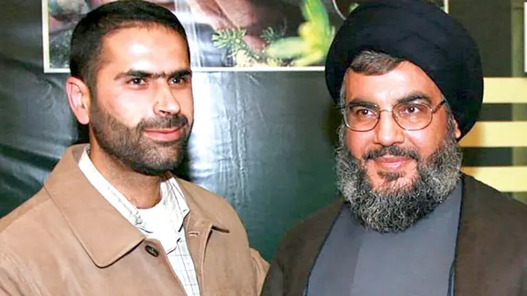 Wissam al Tawil (a la izquierda) junto al l&iacute;der de Hezbol&aacute;, Hassan Nasrallah./ HEZBOL&Aacute;