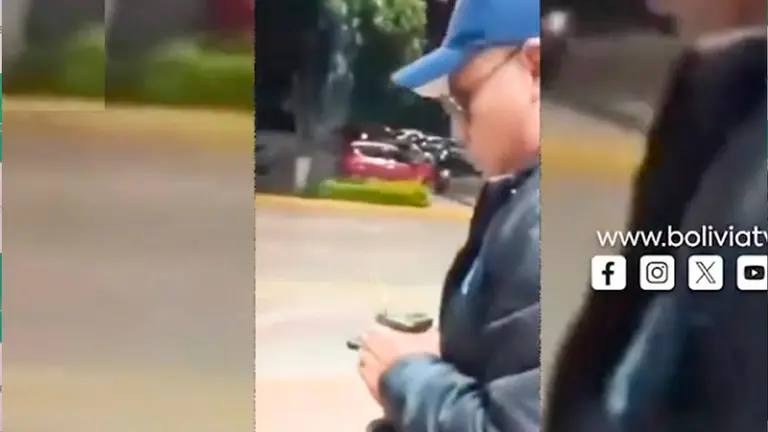 El senador Loza al momento de ser increpado por una ciudadana. CAPTURA