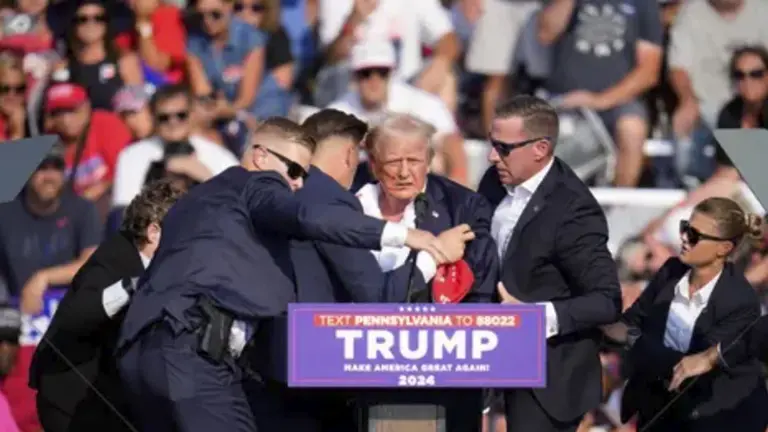Trump, evacuado de un mitin tras sufrir aparente atentado. / CAPTURA